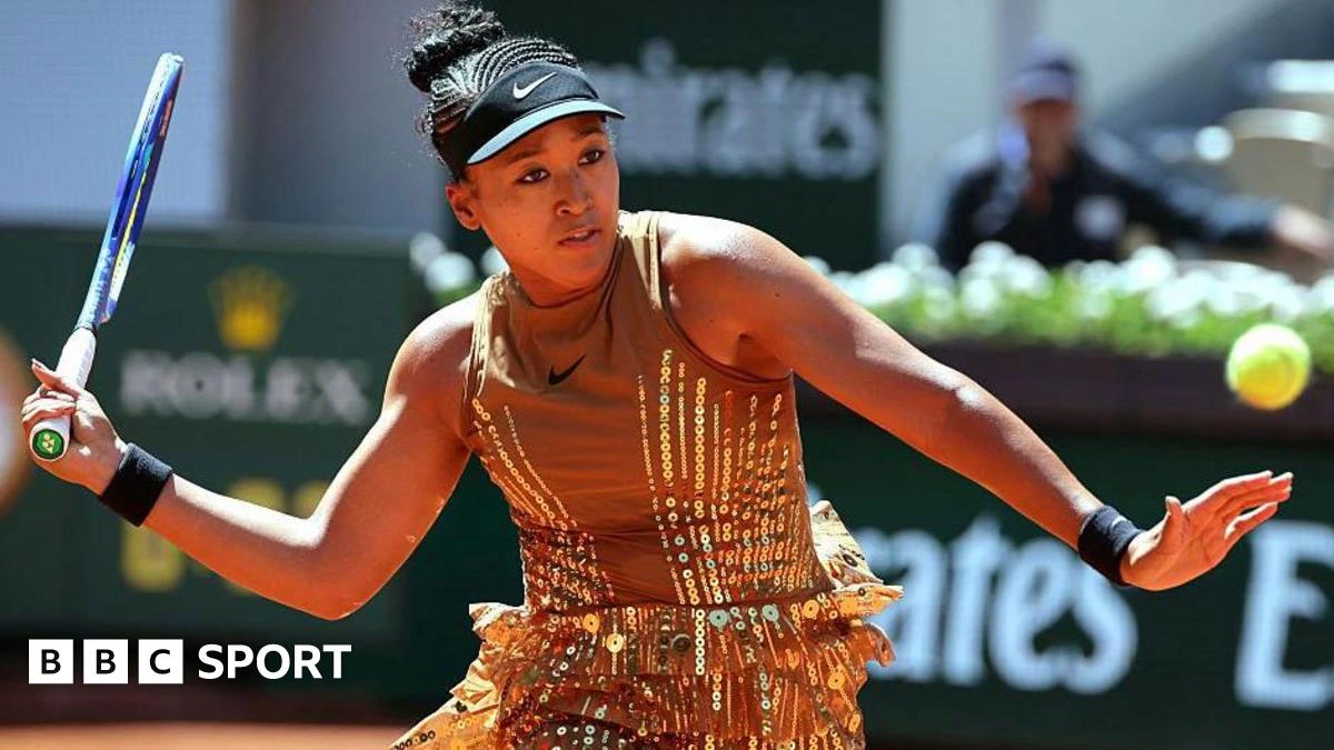 Osaka sparkles in golden French Open outfit