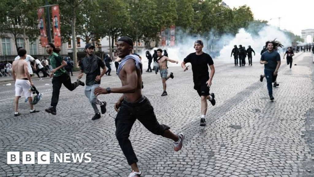 Hundreds arrested and dozens of police injured after Champions League riots in France