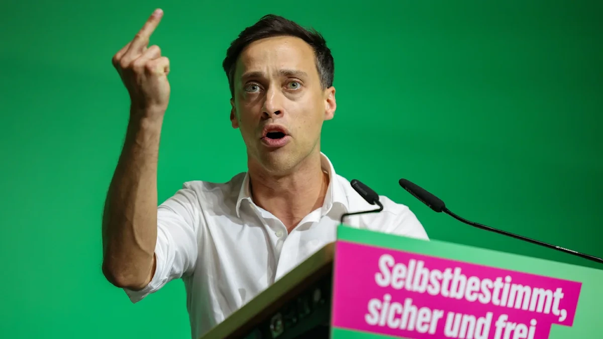 Mit ausgestrecktem Mittelfinger: So bewirbt sich ein Grüner für einen Spitzenjob