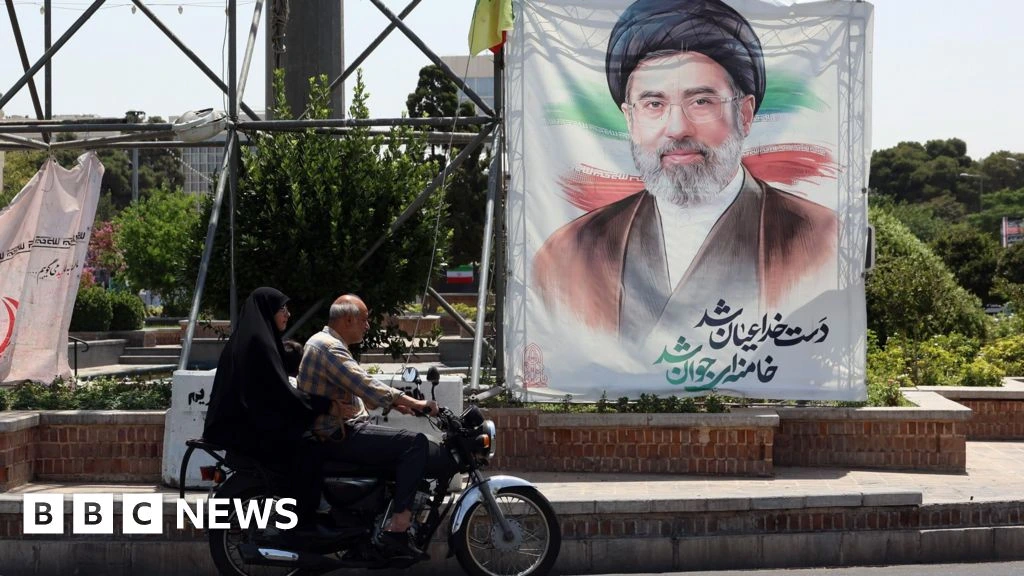 Iran supreme leader calls for revenge after father's burial